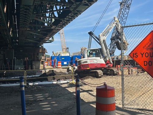 Construction vehicles under WALK Bridge